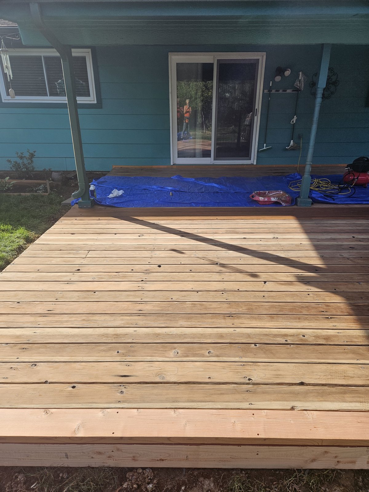 The same deck sanded and restored back to fresh, natural wood